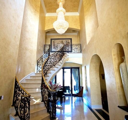 TPC Golf Course Estate — grand staircase interior